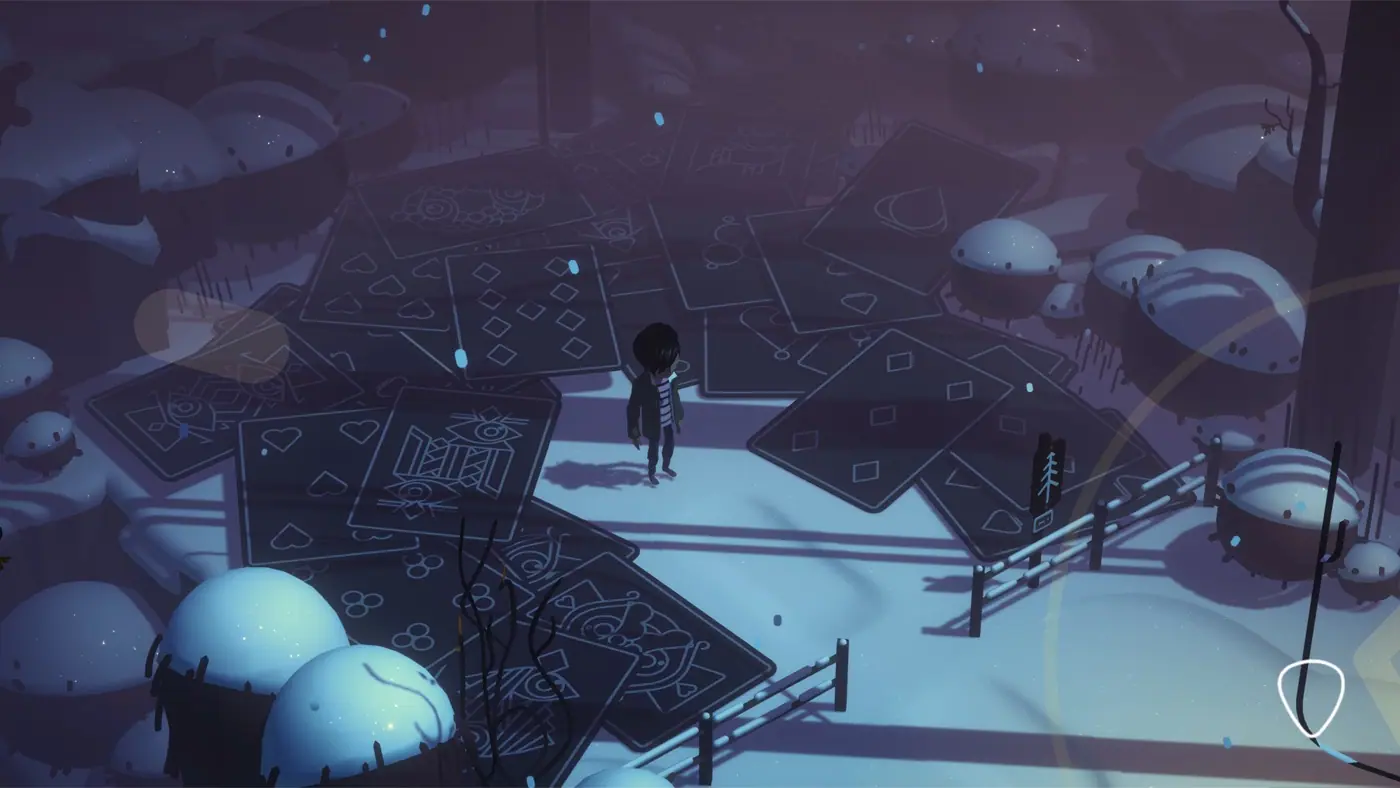 A dusk-lit landscape of giant scattered playing cards under a violet twilight sky